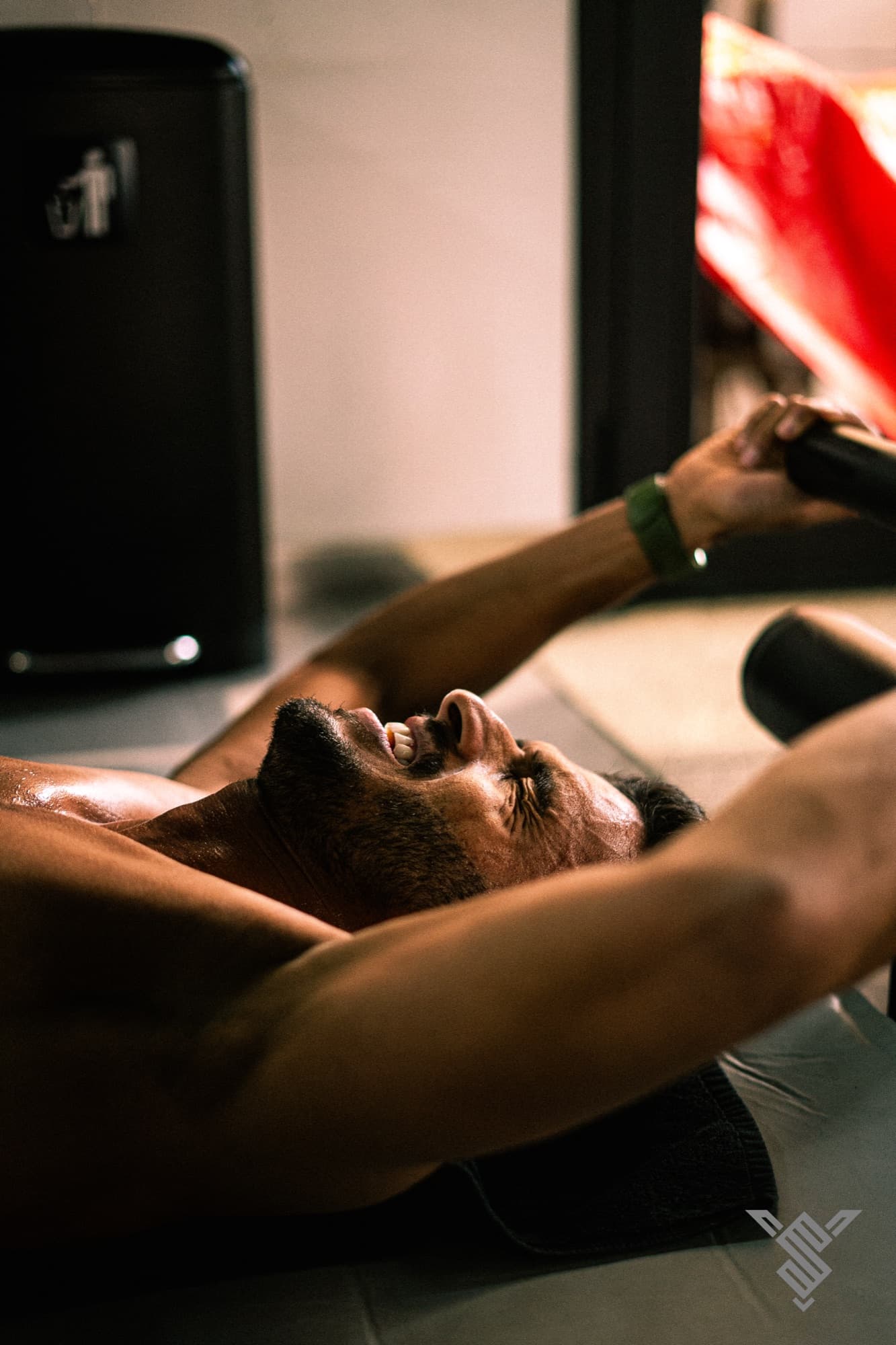 Athlete resting on a bench between sets at Youskilled
